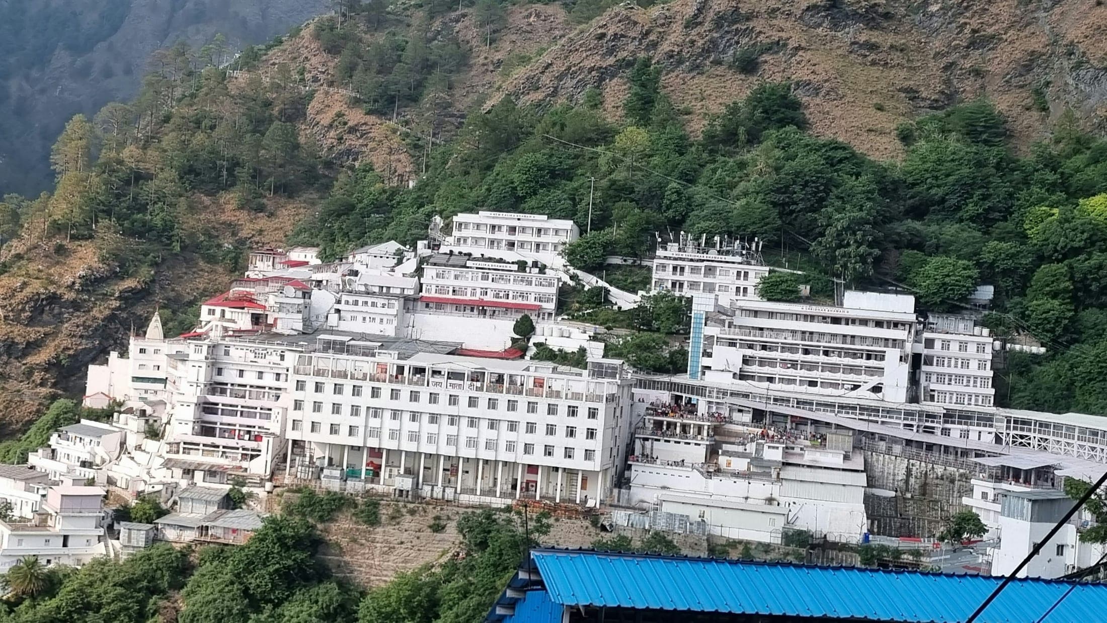 The Vaishno Devi shrine complex built into the mountainside above Katra